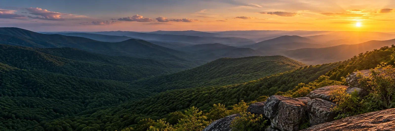 Illustration of a sunset over forested mountain ridges